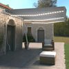 vidaXL Auvent manuel r&eacute;tractable avec LED 600x350 cm Bleu et blanc