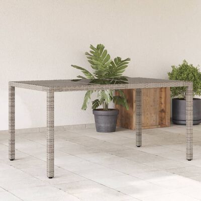 vidaXL Table de jardin dessus en verre Gris 150x90x75cm Résine tressée