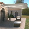 vidaXL Auvent manuel r&eacute;tractable avec LED 450x350 cm Cr&egrave;me
