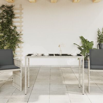 vidaXL Table de jardin dessus en verre gris clair 115x54x74 cm rotin