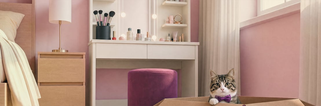 Chat qui regarde depuis une boîte vidaXL dans une chambre avec coiffeuse et tiroirs de rangement.