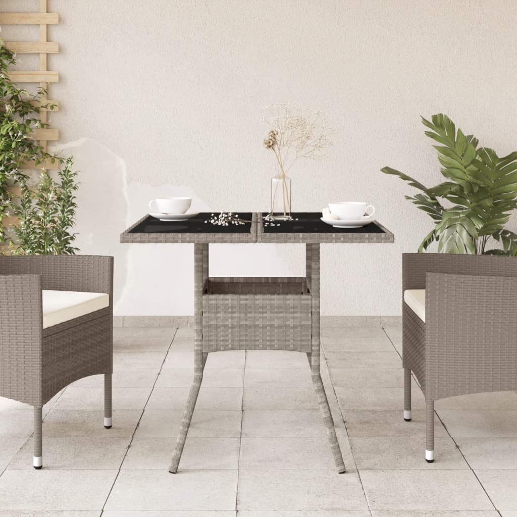 vidaXL Table de jardin avec dessus en verre gris clair résine tressée